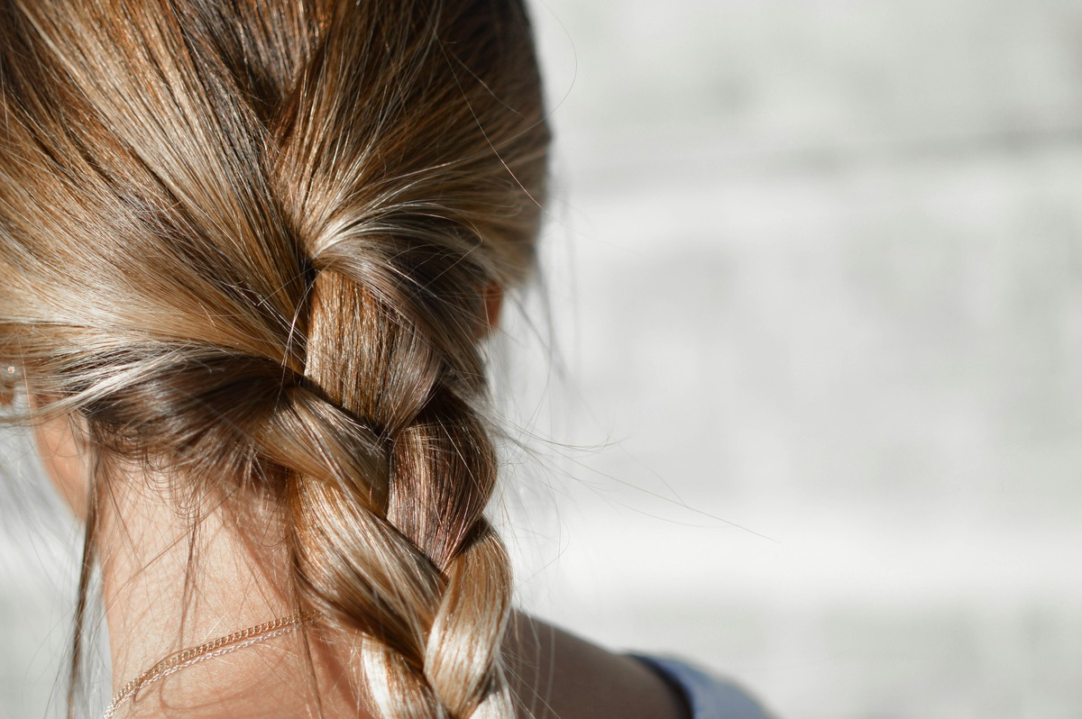 Create A Stunning Braided Ponytail In Long Hair