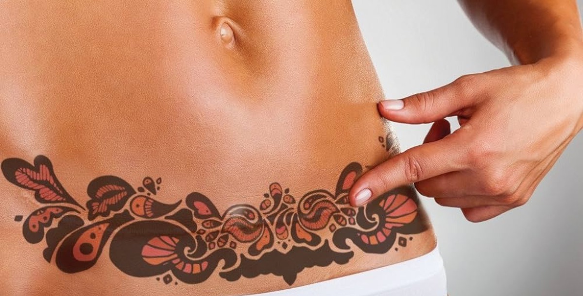 The Perfect Tattoo To Cover Your Tummy Tuck Scar