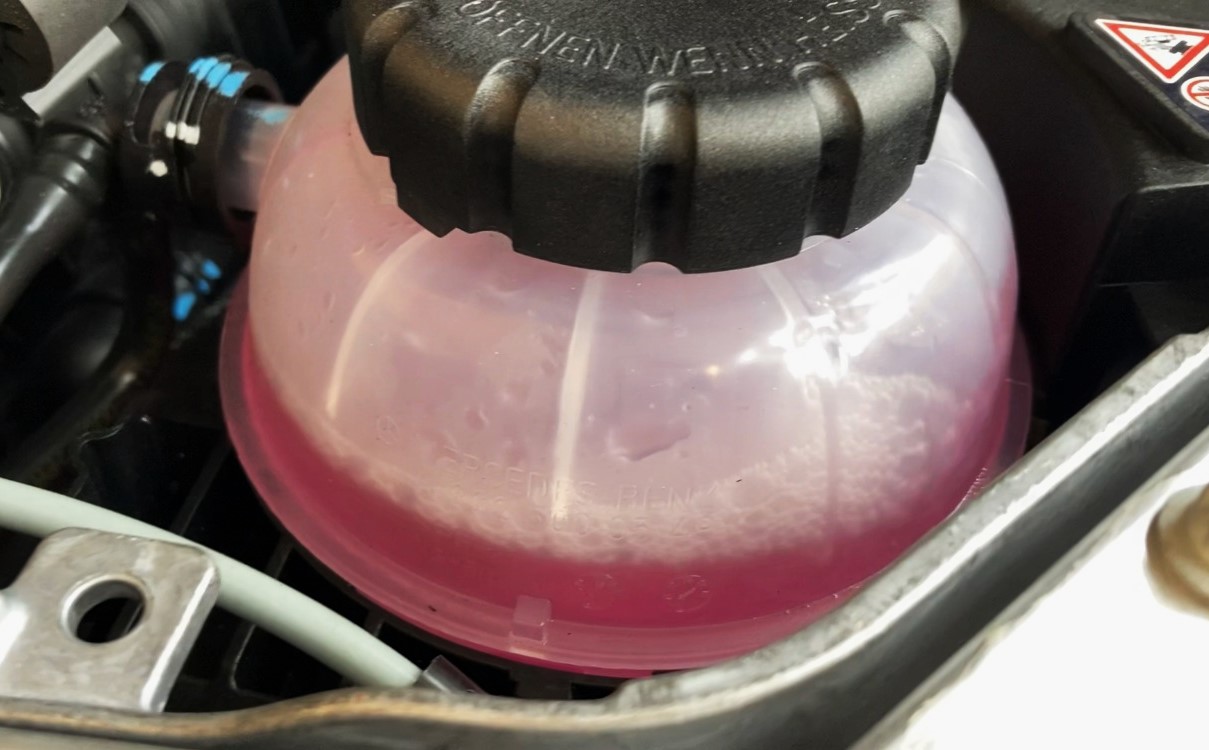 The Surprising Reason Your Coolant Is Bubbling Out Without Overheating