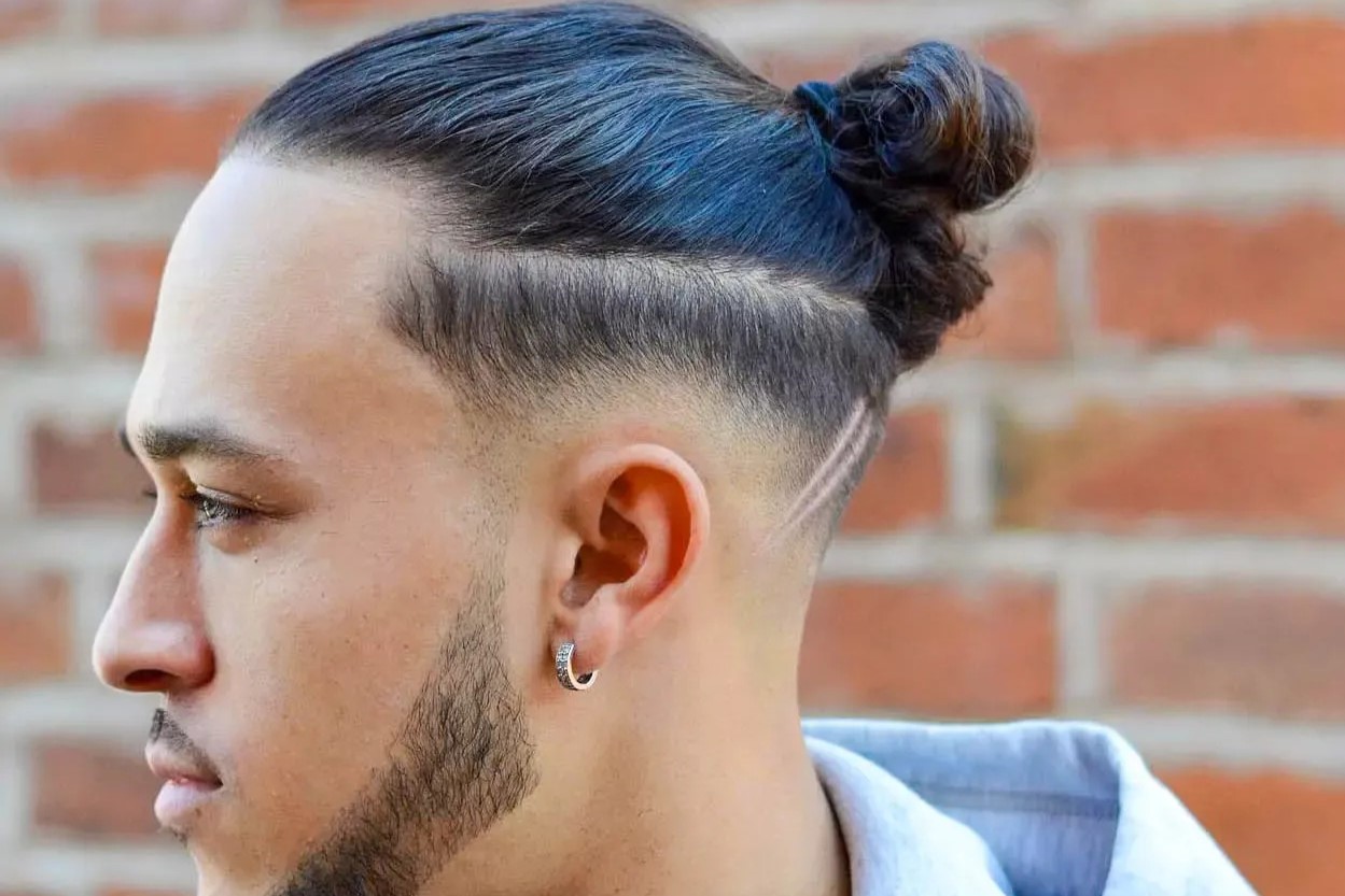 Unveiling The Controversial Appeal Of The Man Bun Undercut: Is It Girly Or Glamorous?